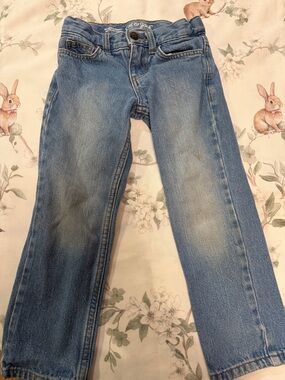 Four pairs of T4 (toddler 4) jeans.